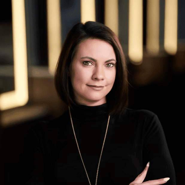 Portrait of Sarah, a professional stylist at Salon Bliss & Spa, showcasing their expertise and style.