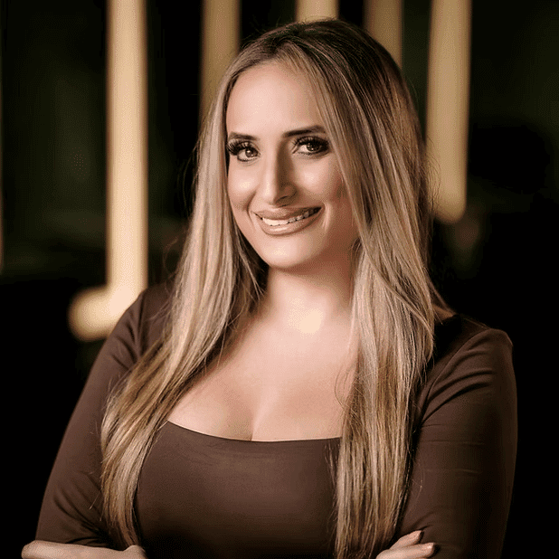 Portrait of Daniela, a professional stylist at Salon Bliss & Spa, showcasing their expertise and style.