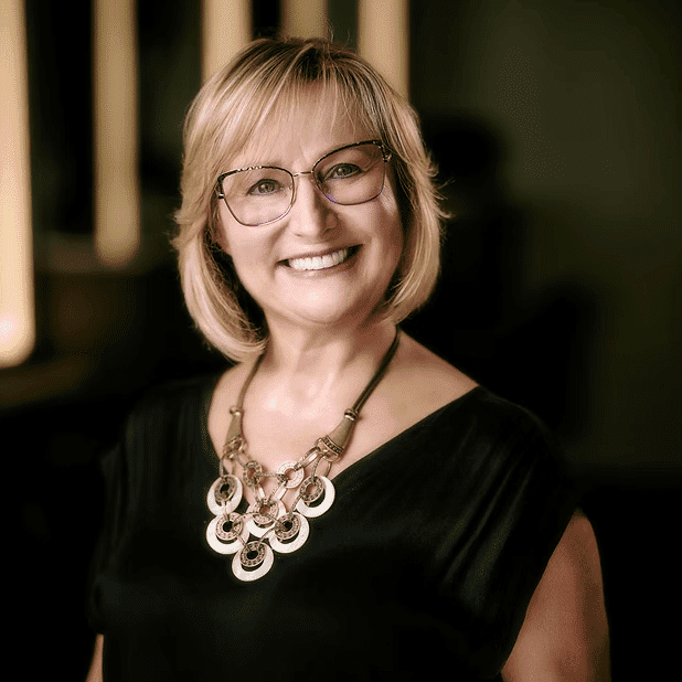 Portrait of Mariana, a professional stylist at Salon Bliss & Spa, showcasing their expertise and style.