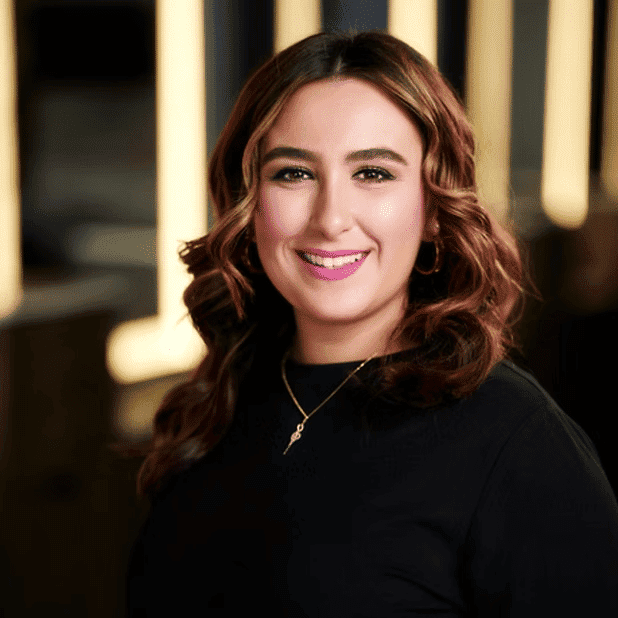 Portrait of Mariella, a professional stylist at Salon Bliss & Spa, showcasing their expertise and style.