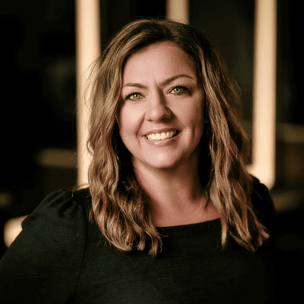Portrait of Jennifer, a professional stylist at Salon Bliss & Spa, showcasing their expertise and style.