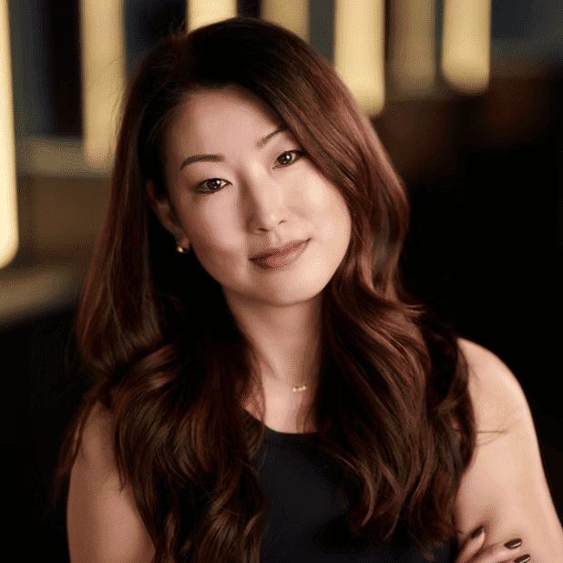 Portrait of Lu, a professional stylist at Salon Bliss & Spa, showcasing their expertise and style.
