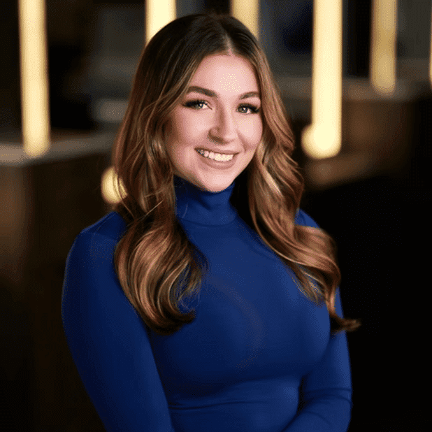 Portrait of Alaina, a professional stylist at Salon Bliss & Spa, showcasing their expertise and style.