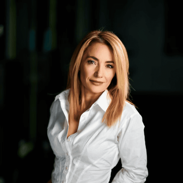 Portrait of Anna I., a professional stylist at Salon Bliss & Spa, showcasing their expertise and style.