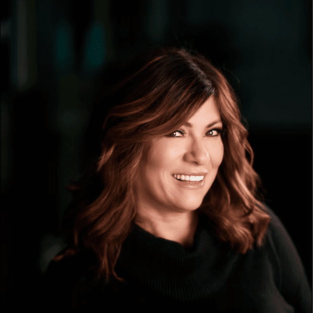 Portrait of Claudette, a professional stylist at Salon Bliss & Spa, showcasing their expertise and style.