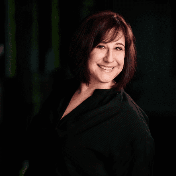 Portrait of Jen, a professional stylist at Salon Bliss & Spa, showcasing their expertise and style.