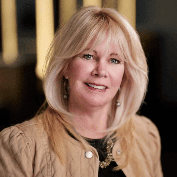 Portrait of Pam, a professional stylist at Salon Bliss & Spa, showcasing their expertise and style.