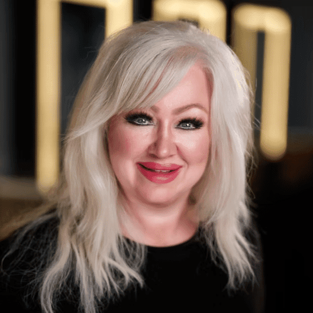 Portrait of Meredith, a professional stylist at Salon Bliss & Spa, showcasing their expertise and style.