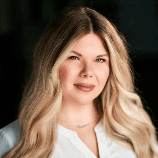 Portrait of Krystle K., a professional stylist at Salon Bliss & Spa, showcasing their expertise and style.