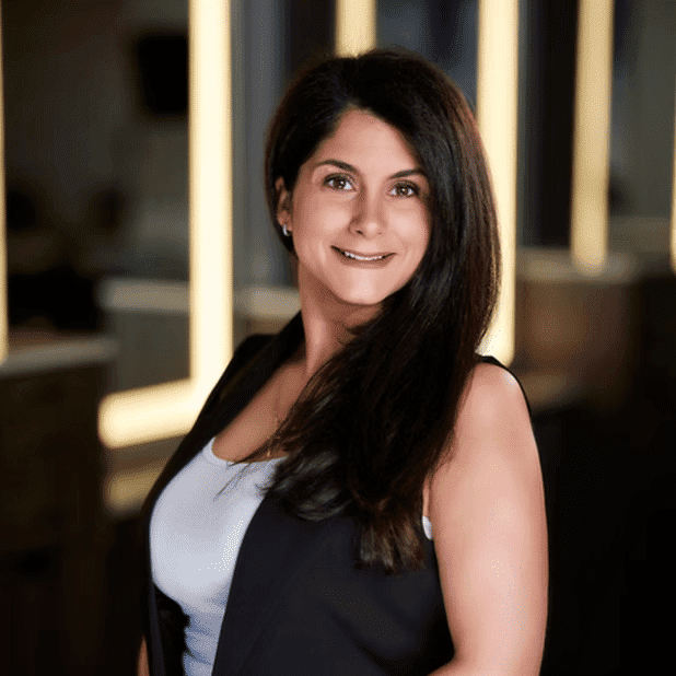 Portrait of Marcella, a professional stylist at Salon Bliss & Spa, showcasing their expertise and style.