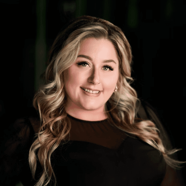 Portrait of Gina C., a professional stylist at Salon Bliss & Spa, showcasing their expertise and style.