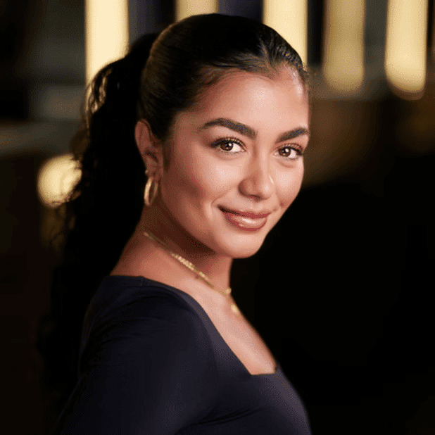 Portrait of Romina, a professional stylist at Salon Bliss & Spa, showcasing their expertise and style.