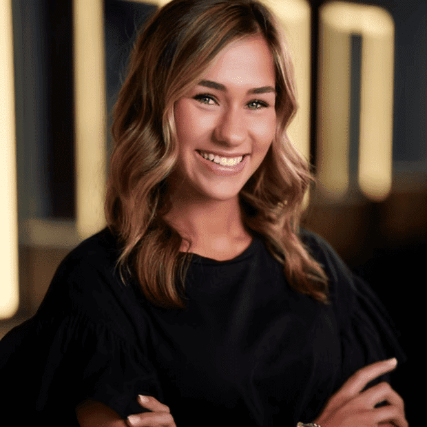 Portrait of Taylor, a professional stylist at Salon Bliss & Spa, showcasing their expertise and style.